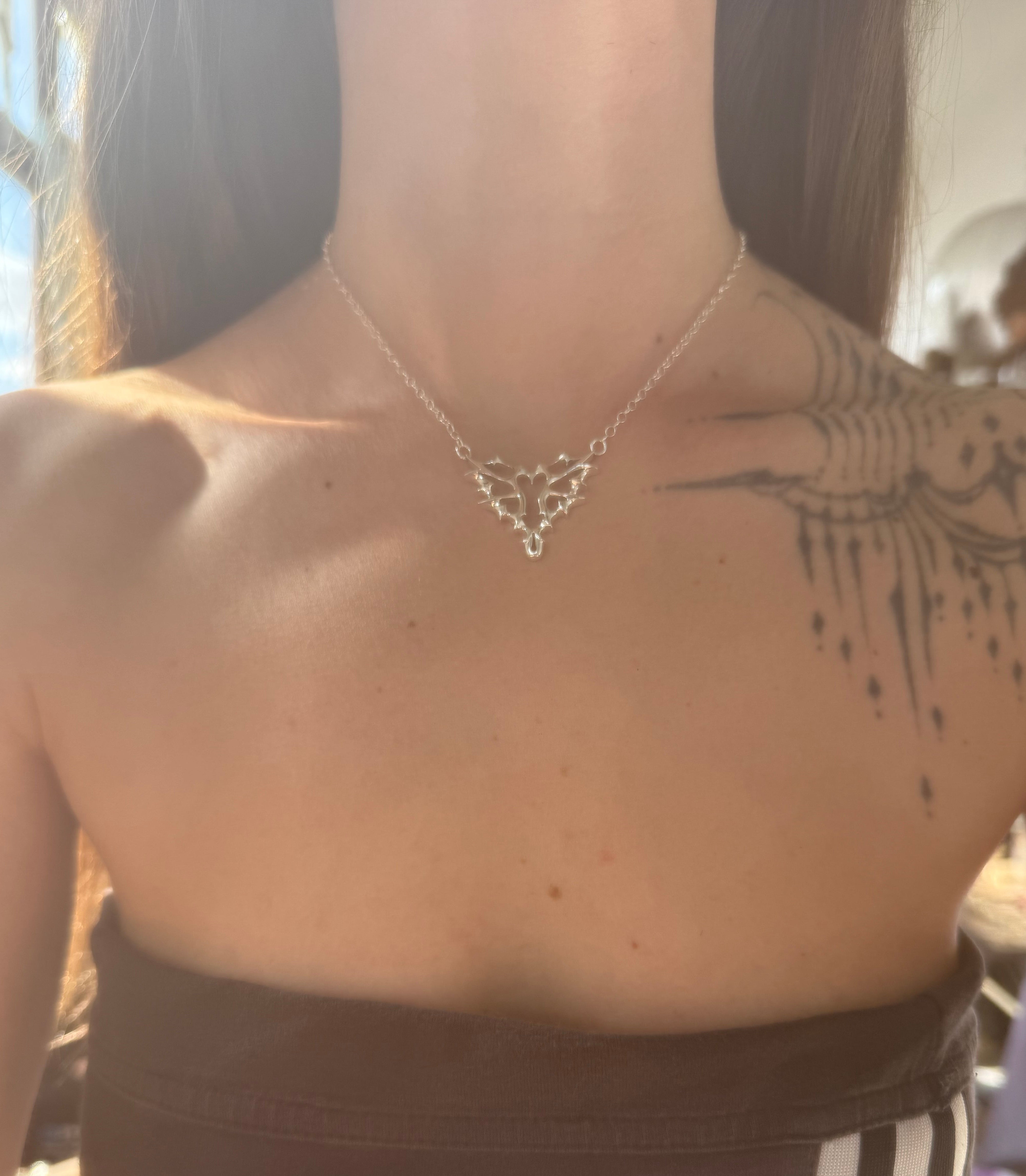 Xrated Heart necklace
