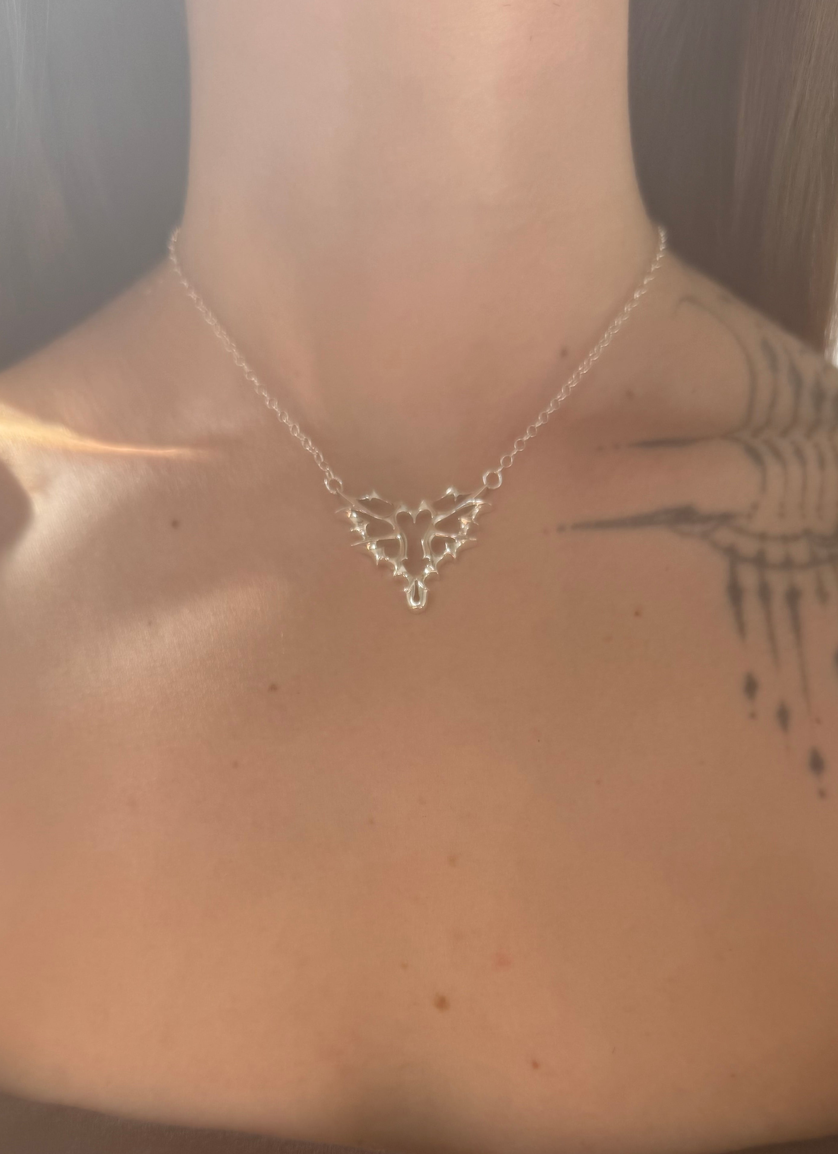 Xrated Heart necklace