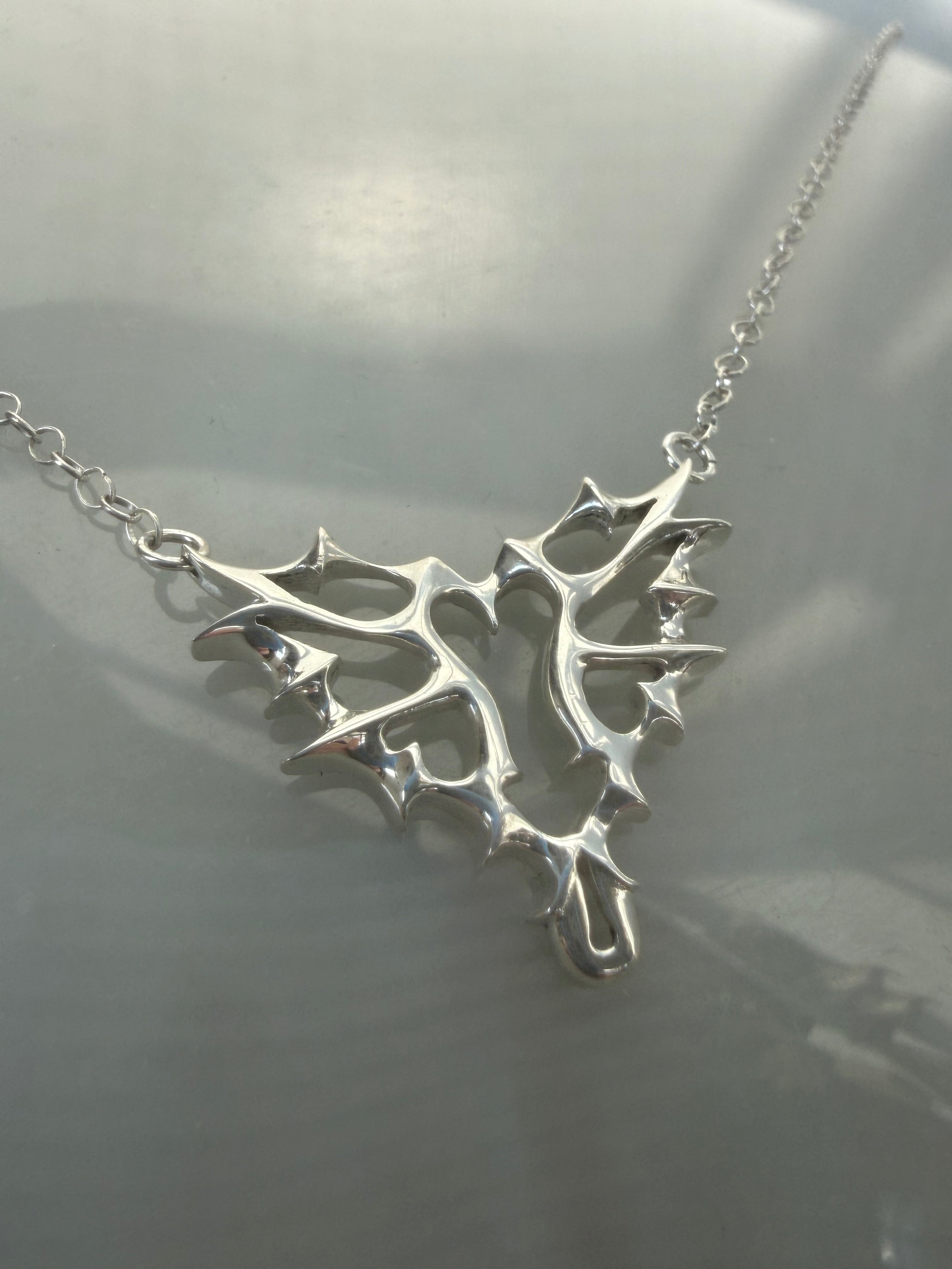 Xrated Heart necklace